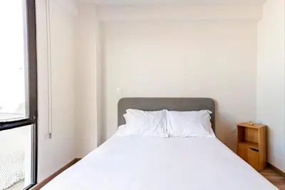 Cama o camas de una habitación en Moderno Loft Totalmente Equipado