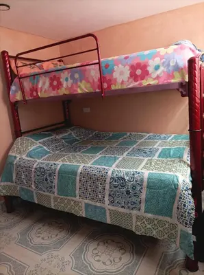 Cama o camas de una habitación en La Casa de los Abuelos