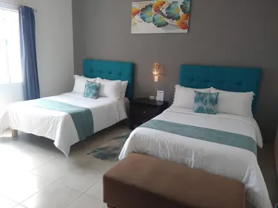 Cama o camas de una habitación en Posada Los Fuertes