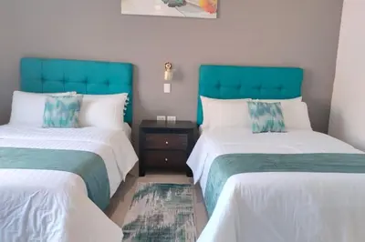 Cama o camas de una habitación en Posada Los Fuertes