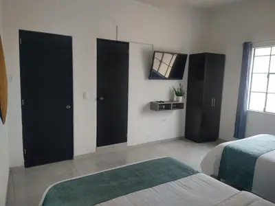 Cama o camas de una habitación en Posada Los Fuertes