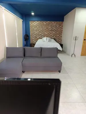Zona de estar de El Árbol Plaza - Suites Aire