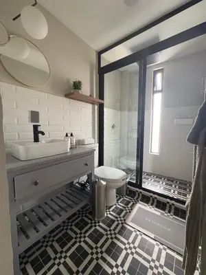 Un baño de Loft ËNXË Boutique Habitación Gray