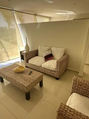Zona de estar de Increíbles condominios con vista al mar