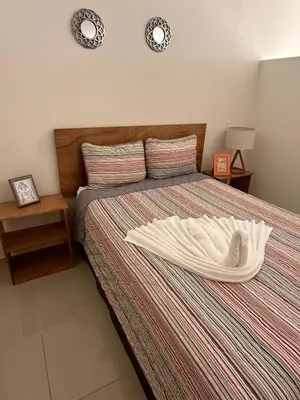 Cama o camas de una habitación en Increíbles condominios con vista al mar