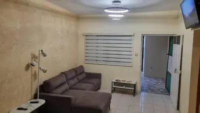 Zona de estar de Departamento de 2 habitaciones en Casa la Experimental
