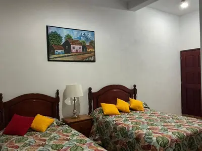 Cama o camas de una habitación en Hotel Y Villas el Encuentro