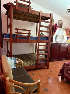 Cama o camas de una habitación en Casa Vacacional Oaxtepec Morelos