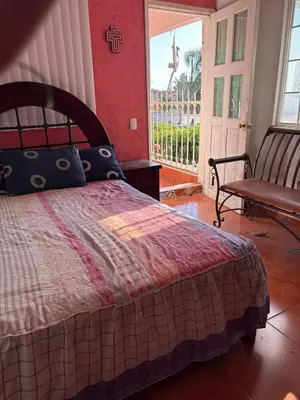 Cama o camas de una habitación en Casa Vacacional Oaxtepec Morelos