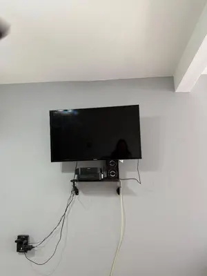 Una televisión o centro de entretenimiento en El Rinconcito Oaxaca - HiveNB