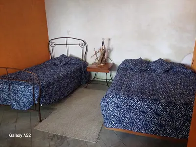 Cama o camas de una habitación en La Casa D'Alick