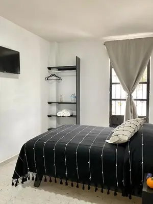 Cama o camas de una habitación en Casa Monarca