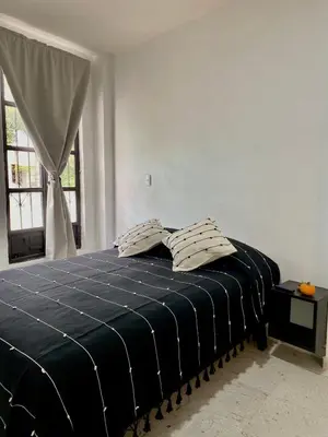 Cama o camas de una habitación en Casa Monarca