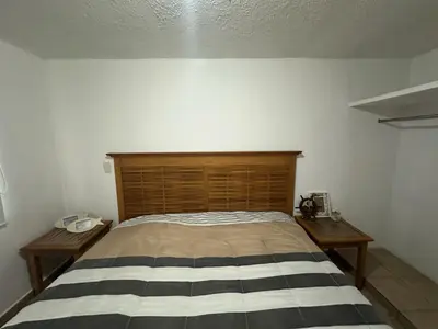 Cama o camas de una habitación en Casa villas tulipanes Acapulco