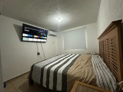 Cama o camas de una habitación en Casa villas tulipanes Acapulco