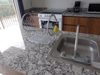 Una cocina o zona de cocina en Departamento para 6 vista al mar con alberca y embarcadero
