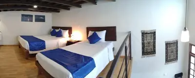 Cama o camas de una habitación en Aroma Hotel