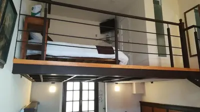 Litera o literas de una habitación en Aroma Hotel