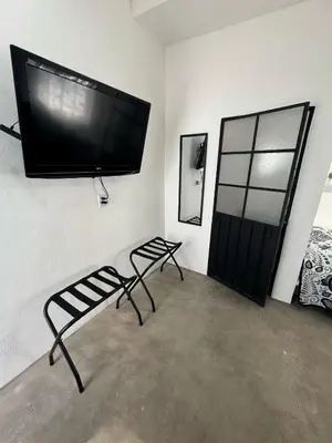 Una televisión o centro de entretenimiento en Casa Dandy- 2 habitaciones disponibles