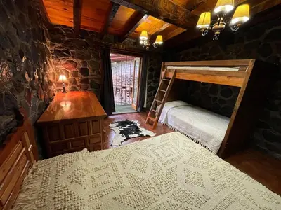 Cama o camas de una habitación en Swiss Cabin in Popo Park near Popocatépetl