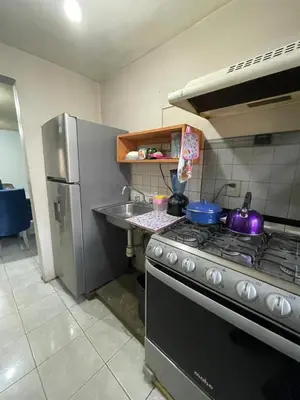 Una cocina o zona de cocina en Amplia casa para huéspedes