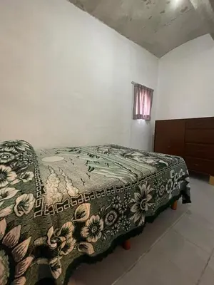 Cama o camas de una habitación en Amplia casa para huéspedes