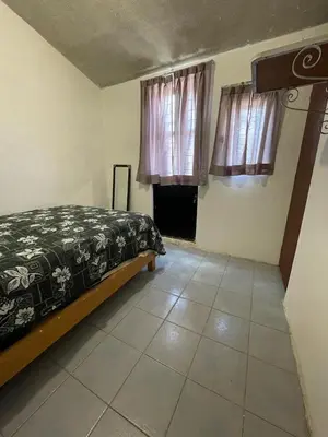 Cama o camas de una habitación en Amplia casa para huéspedes