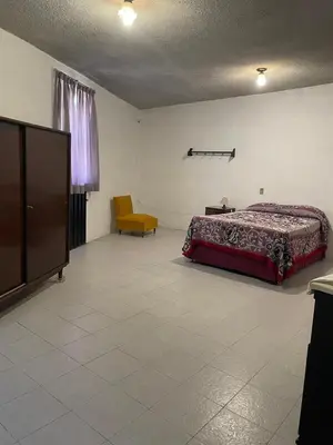 Cama o camas de una habitación en Amplia casa para huéspedes