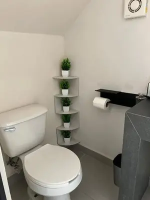Un baño de Hermosa casa alberca climatizada