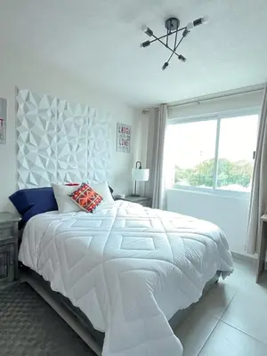 Cama o camas de una habitación en Hermosa casa alberca climatizada
