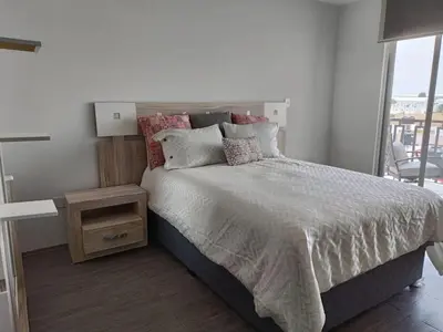 Cama o camas de una habitación en Gran departamento de lujo ejecutivo con alberca