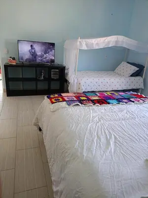 Cama o camas de una habitación en Family Residential