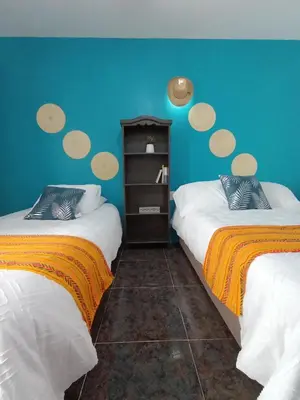 Cama o camas de una habitación en Cultural Porfirio 2BR, Centro, Cocina & Parking