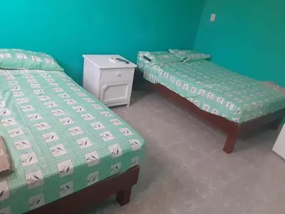 Cama o camas de una habitación en Hotel Toño