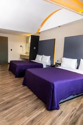 Cama o camas de una habitación en Hotel Aranjuez