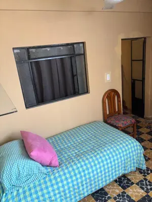 Cama o camas de una habitación en La Adornada Girasol
