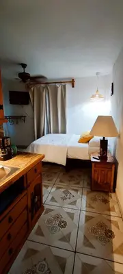 Cama o camas de una habitación en La Adornada Gladiola