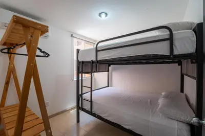 Cama o camas de una habitación en Departamento El Dorado