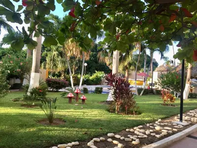Jardín al aire libre en Departamento frente a la playa