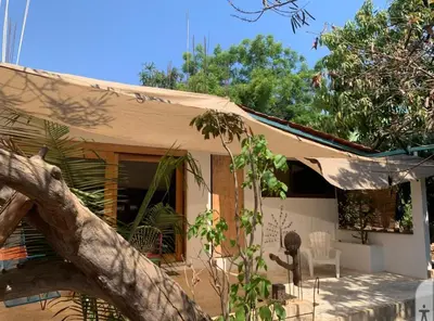 Edificio en el que se encuentra la habitación en casa particular