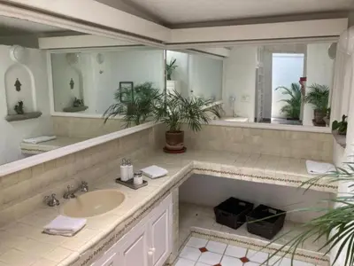 Un baño de Exclusiva Propiedad Vacacional