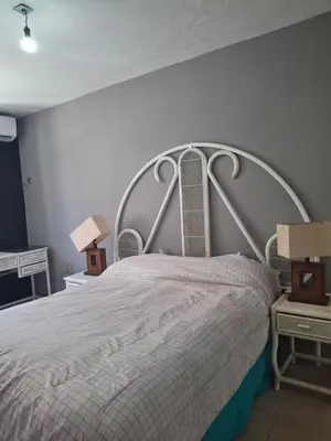 Cama o camas de una habitación en Casa las palmeras