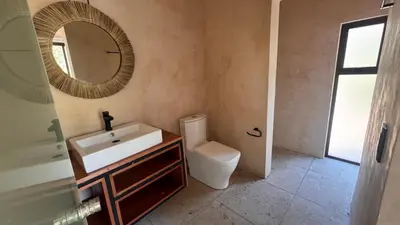 Un baño de Hotel Renata