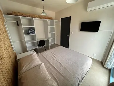 Cama o camas de una habitación en Veracruz La Calma Departamento