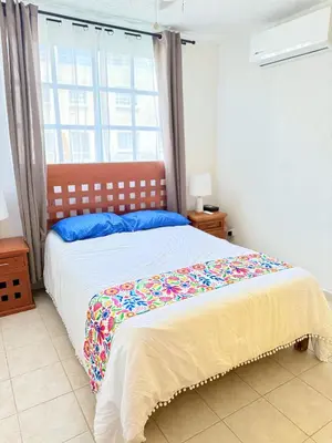 Cama o camas de una habitación en Departamento frente a playa bonfil