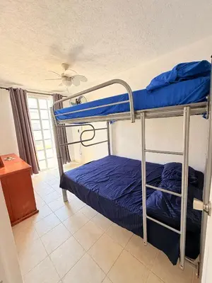 Cama o camas de una habitación en Departamento frente a playa bonfil