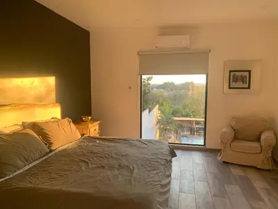 Cama o camas de una habitación en Casa del Unicornio Azul
