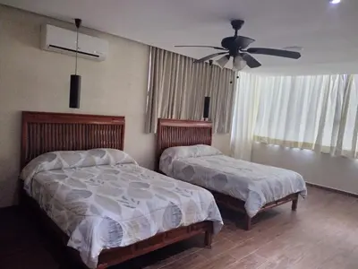 Cama o camas de una habitación en Casa Kleha Familiar y Comodidad