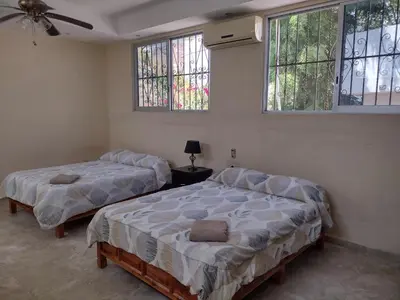 Cama o camas de una habitación en Casa Kleha Familiar y Comodidad