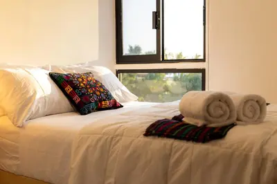 Cama o camas de una habitación en Esssential PXM Arkitainer Residential Lofts